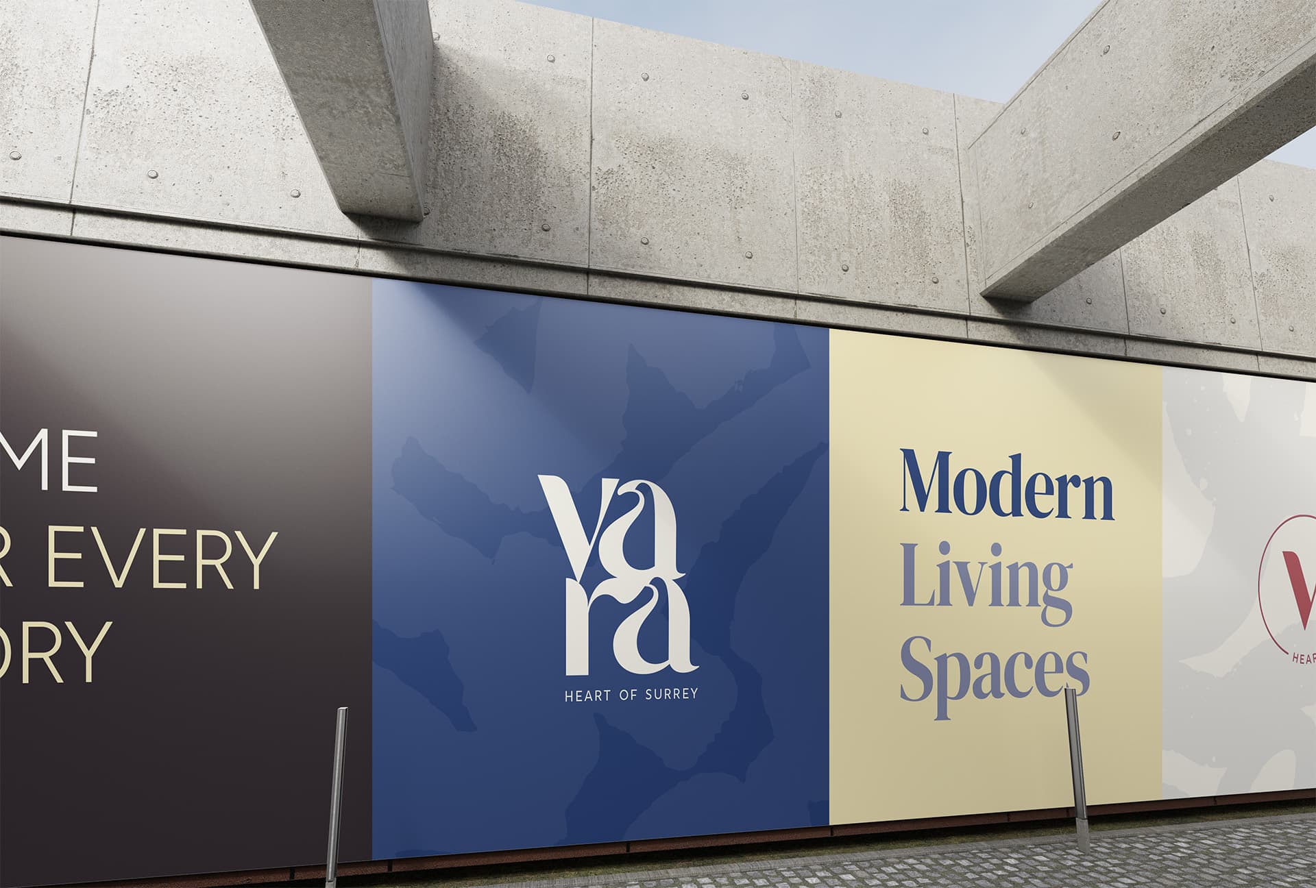 Vara construction hoarding on a concrete wall with the Vara Heart of Surrey logo and a 'Modern Living Spaces' panel