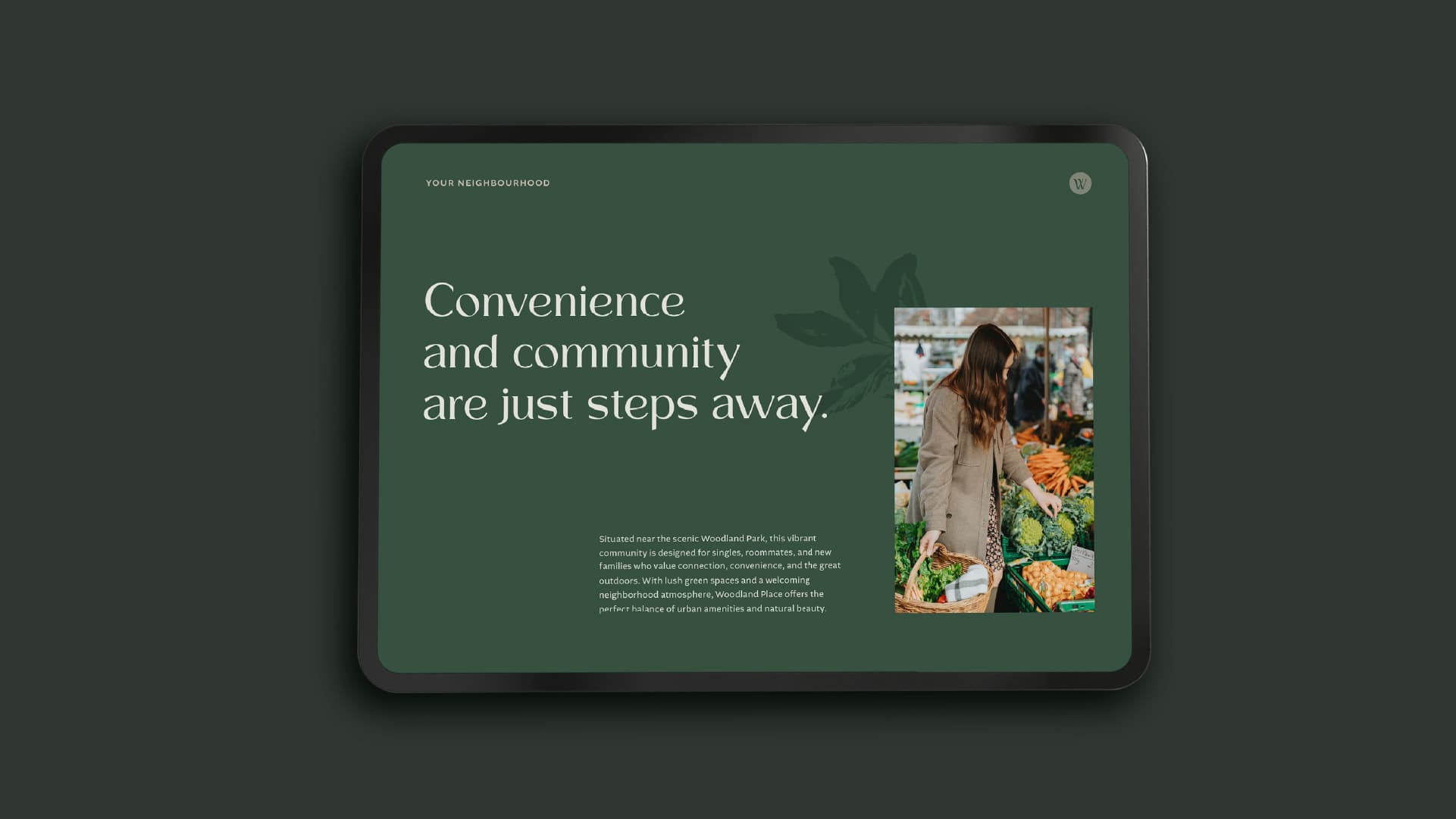 Tablet showing a Woodland Place page headlined 'Convenience and community are just steps away.'